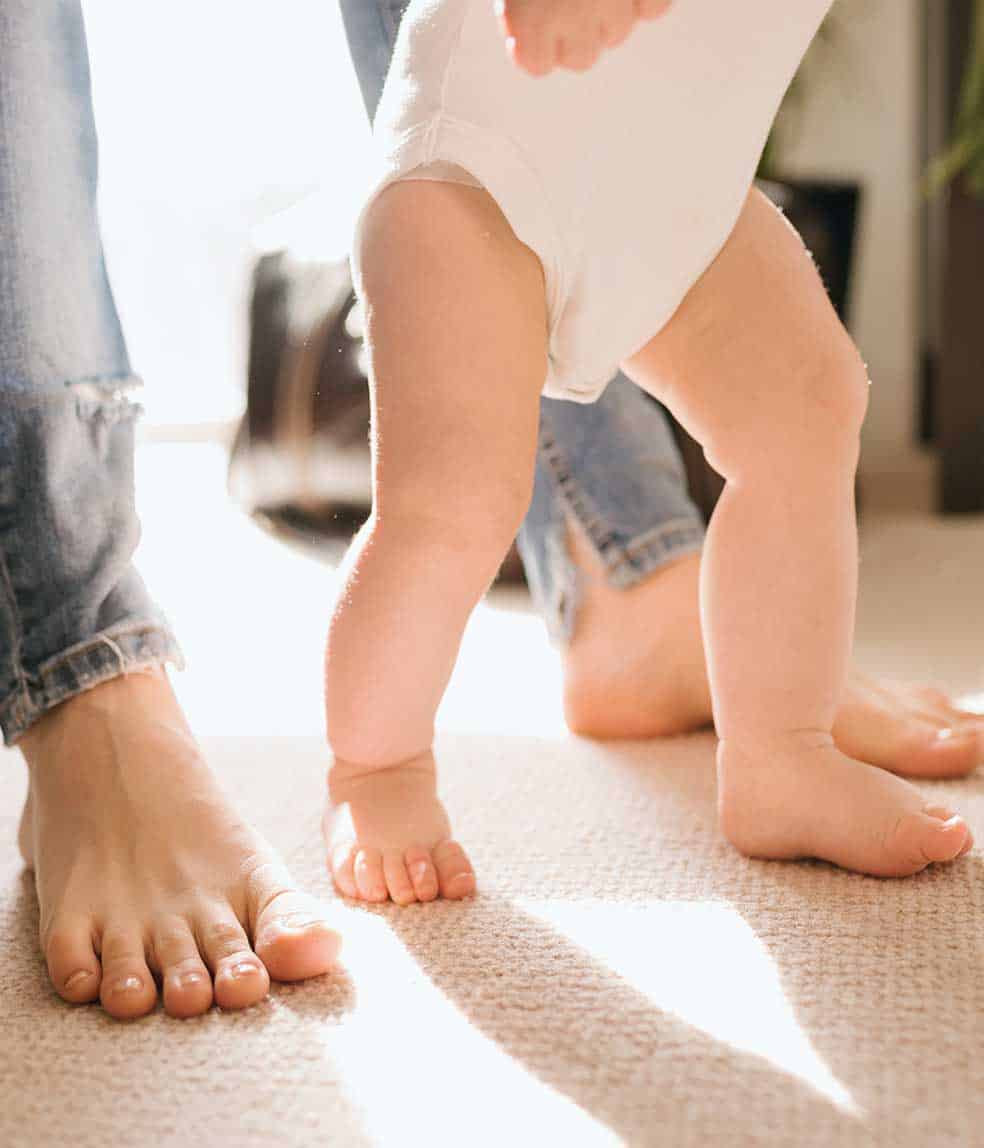 Family walking on clean carpets | CottageCare